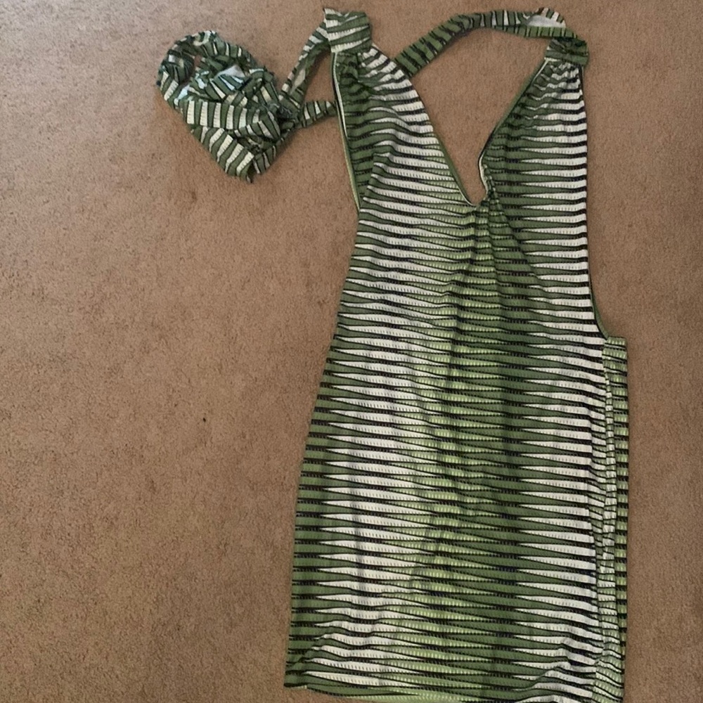 Medium body dress stretchy material with body,cross  strings